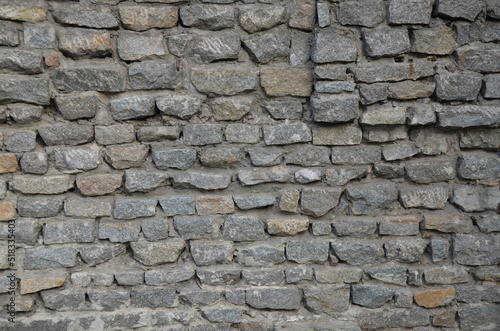 Background gray stone wall. Vertical photo
