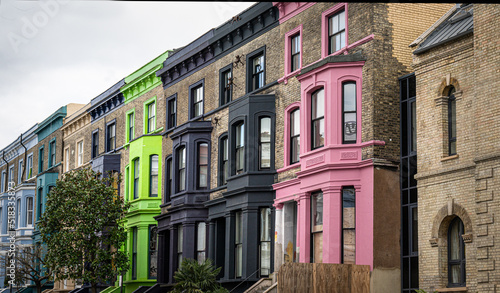 Colourful painted houses in the well known Portobello Road area of Notting Hill, London, UK