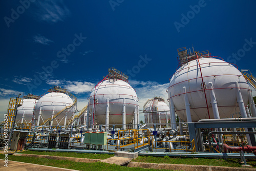 White spherical propane tanks containing fuel gas photo