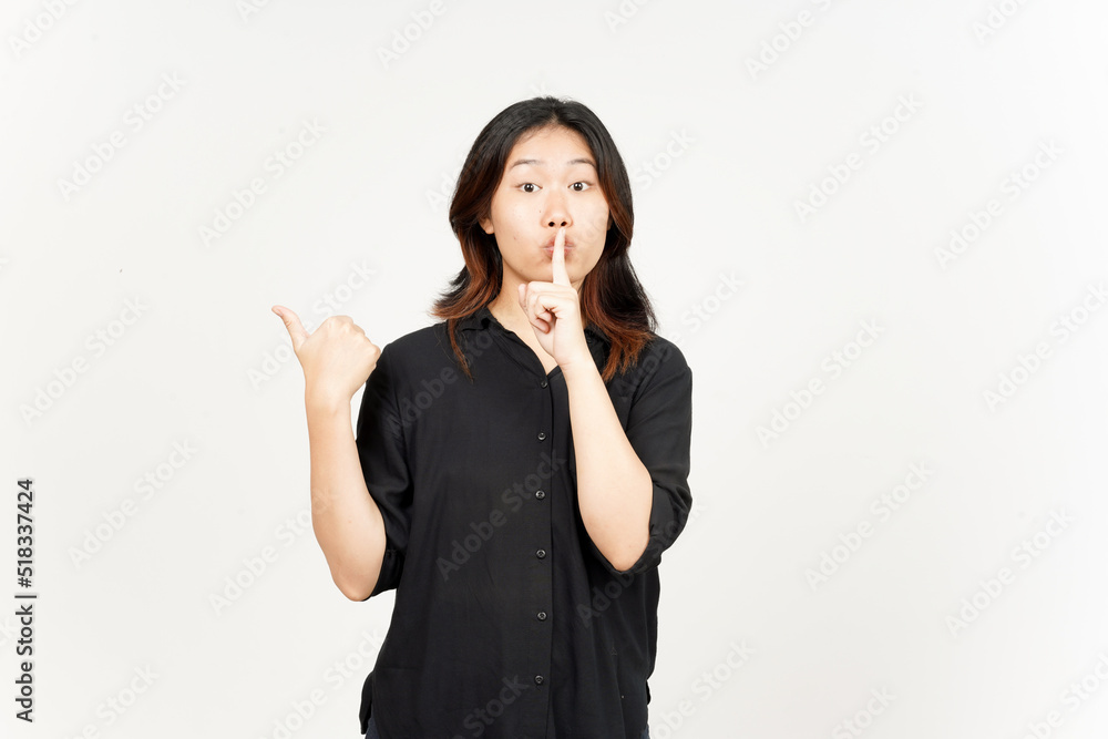 Shh gesture, Presenting and Pointing Side Product Using Thumb of Beautiful Asian Woman Shh gesture, Presenting and Pointing Side Product Using Thumb of Beautiful Asian Woman