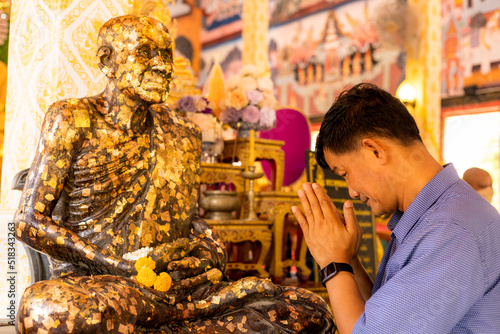 Buddhists make merit at the temple, religious days, Ubon Ratchathani Province, Thailand, Asia.