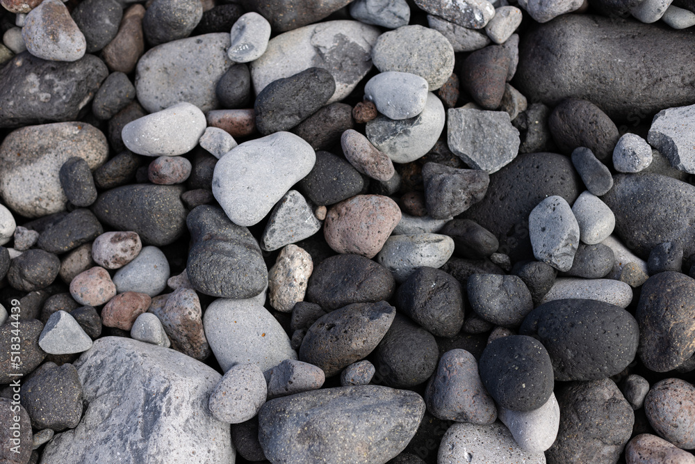 Texture of the seashore with stones. Natural background.