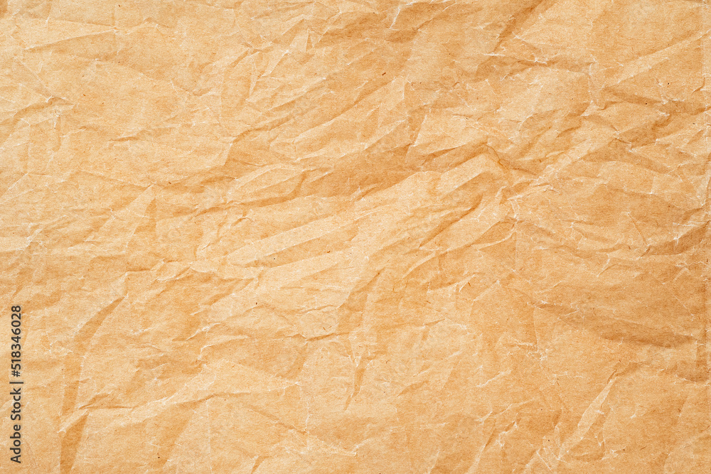 Fototapeta premium Crumpled thin parchment paper as texture or background, baking parchment
