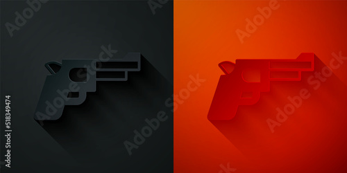 Paper cut Pistol or gun icon isolated on black and red background. Police or military handgun. Small firearm. Paper art style. Vector
