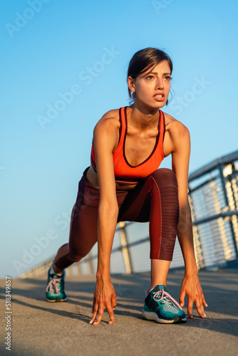 Portrait of fit sporty young woman in city. People sport exercise urban healthy lifestyle concept