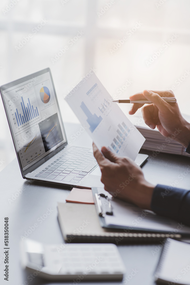 legal Business advisor working at office with documents on his desk, doing planning analyzing the financial report, business plan investment, finance analysis concept legal Business advisor working at office with documents on his desk, doing planning analyzing the financial report, business plan investment, finance analysis concept