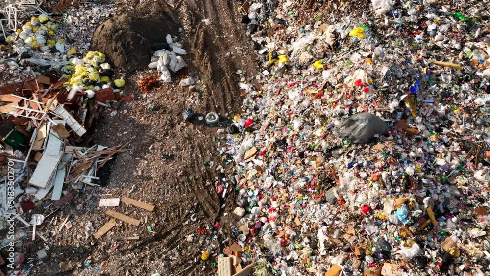 Landfill with rubbish disposal. Garbage dump with waste plastic