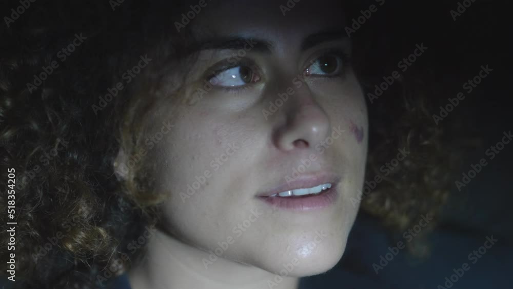 mentally disturbed woman crossing her eyes looking at a flickering light mentally disturbed woman crossing her eyes looking at a flickering light