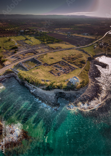 Flight over the port of ancient Engnazia, Fasano (BR) Puglia on the Adriatic Sea, an ancient port of Roman origin today an archaeological site. You can see the buildings of the city and the ancient po