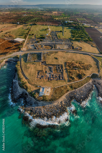 Flight over the port of ancient Engnazia, Fasano (BR) Puglia on the Adriatic Sea, an ancient port of Roman origin today an archaeological site. You can see the buildings of the city and the ancient po