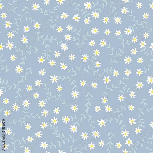 Floral vector print. Small white flowers on light blue background