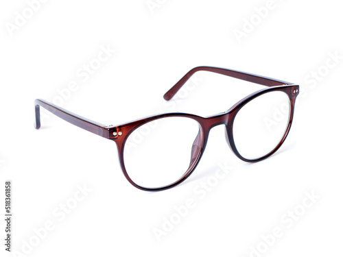 Corrective glasses in a brown plastic frame