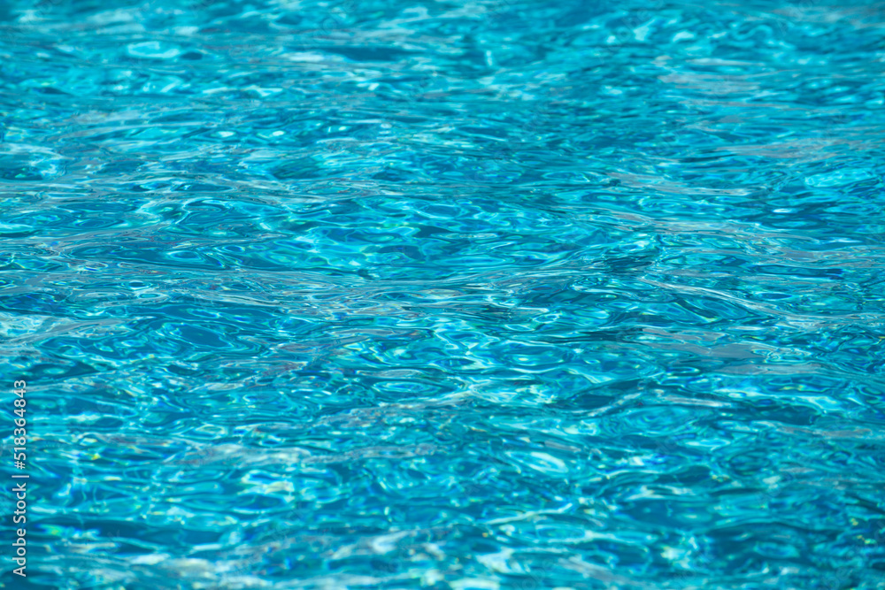 Abstract ripple wave and clear turquoise water surface in swimming pool, blue water wave for background and abstract design. Abstract ripple wave and clear turquoise water surface in swimming pool, blue water wave for background and abstract design.