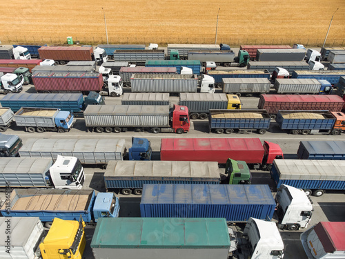 Photography Trucks in line to unload grain at the port
