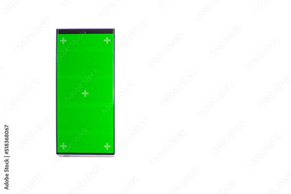 Phone mobile telephone with a vertical green screen in tram chroma key smartphone technology cell phone on white background isolate. Phone mobile telephone with a vertical green screen in tram chroma key smartphone technology cell phone on white background isolate.