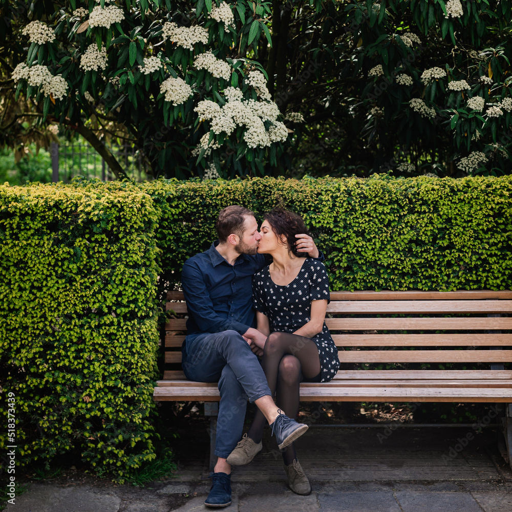 © Irina Efremova/Stocksy - Couple kissing on park bench © Irina Efremova/Stocksy - Couple kissing on park bench