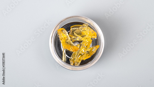 box of golden cannabis concentrate, yellow medical marijuana wax.