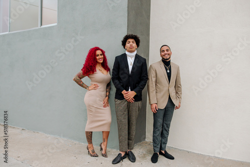 Curvy red-haired mom with sons  photo