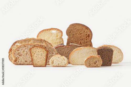 Various types of crusty freshly baked bread photo