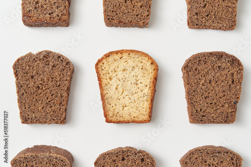 Freshly baked white and brown bread sliced into pieces