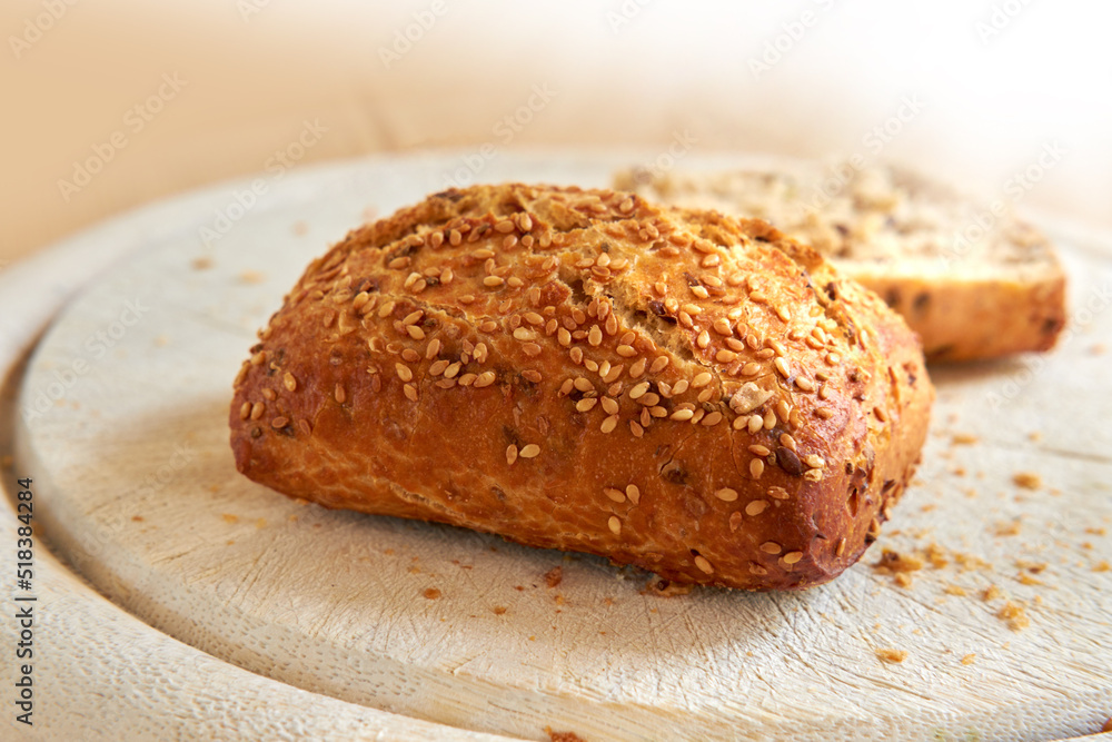 Closeup of freshly baked bread at a bakery with copy space. Zoom in on homemade rye loaves ready to be eaten and enjoyed as a delicious meal. Macro details of a fresh seed bun on display on a counter Closeup of freshly baked bread at a bakery with copy space. Zoom in on homemade rye loaves ready to be eaten and enjoyed as a delicious meal. Macro details of a fresh seed bun on display on a counter