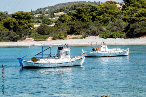 Fishing boats in small Mediterranean bay in sunny summer day © varbenov