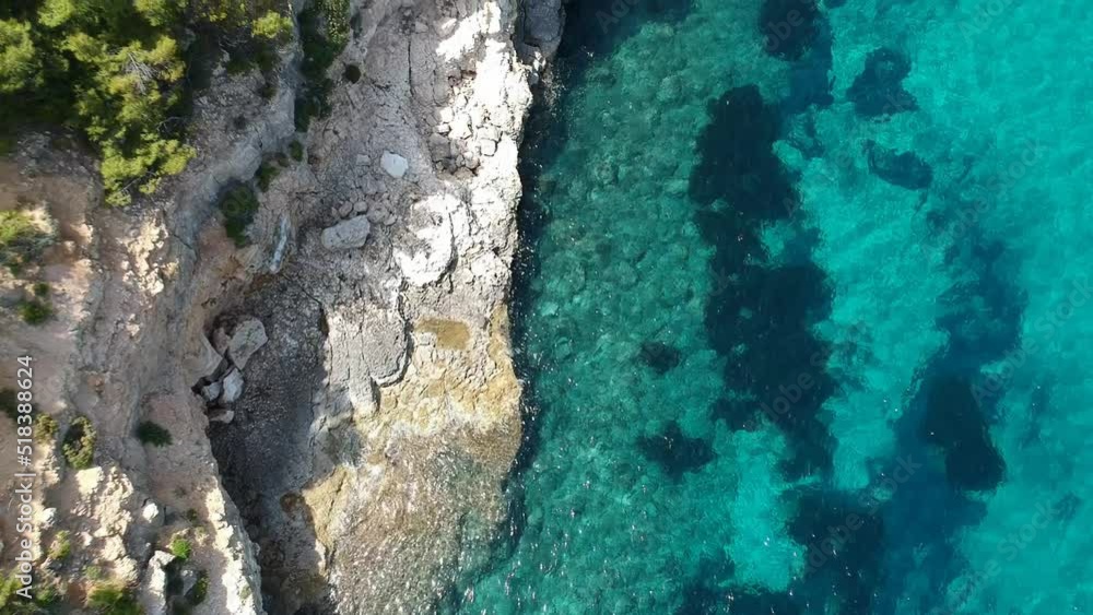 Aerial view over Chrisi Milia beach and the rocky surrounded area in Alonissos island, Greece Aerial view over Chrisi Milia beach and the rocky surrounded area in Alonissos island, Greece