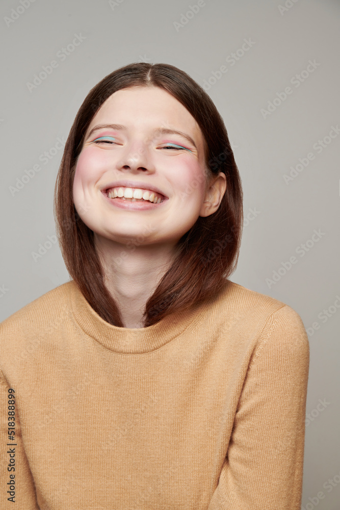 Cheerful woman in stylish sweater in studio Cheerful woman in stylish sweater in studio