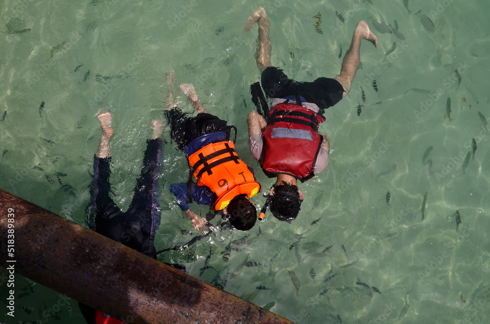Kids snorkel in life jackets and shallow water Stock Photo Adobe Stock