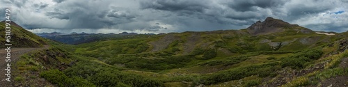 panorama of the high tundra mountains with raining skies
