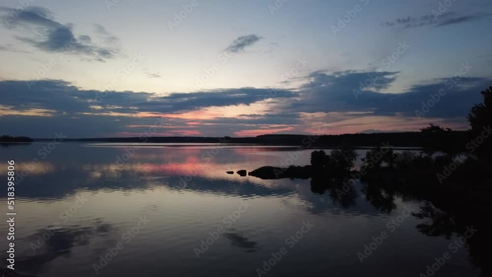 Sunset time lapse with few clouds in the sky and orange and turquoise tones. Cloud movement. Smoke from pipes. Industrial area at sunset. Sunset time lapse with few clouds in the sky and orange and turquoise tones. Cloud movement. Smoke from pipes. Industrial area at sunset.