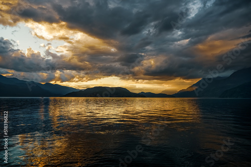 Dramatic sunset sky over the Harrison Lake in Harrison Hot Springs, British Columbia