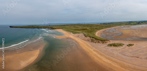 panorama drone landscape view of the beautiful golden sand beach at Lacken Strand on the coast of North Mayo in Ireland