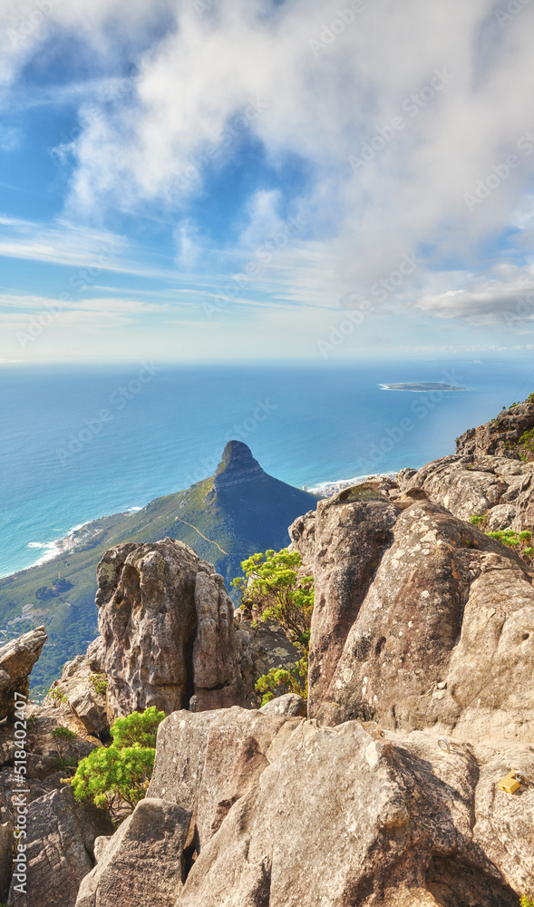 Aerial view of table Mountain in South Africa on a sunny day with copy space. Peaceful morning with views of the blue ocean and Lions Head in Cape Town. Tranquil, serene and calming harmony in nature