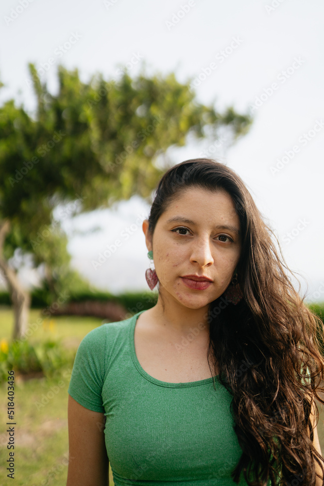 Young woman standing still Young woman standing still
