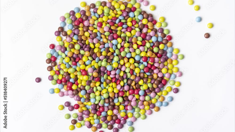 Multicolored dragee candies make text Hello. Stop motion animation flat lay Multicolored dragee candies make text Hello. Stop motion animation flat lay
