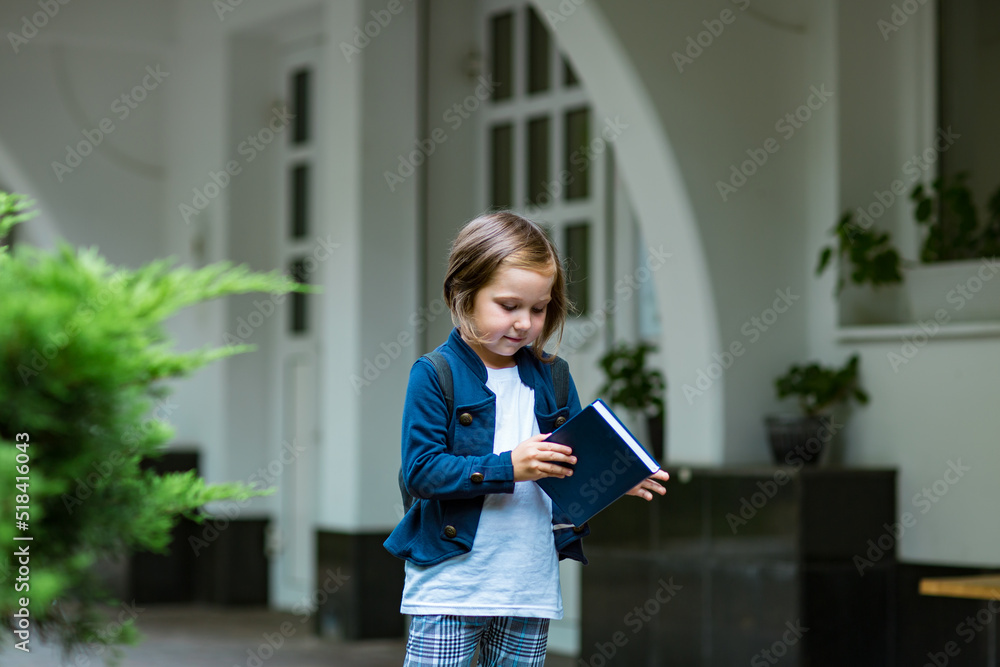 little girl,schoolgirl,in school uniform,in the school yard little girl,schoolgirl,in school uniform,in the school yard