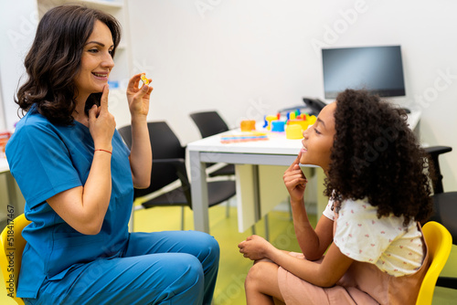 Girl learning to vocalize