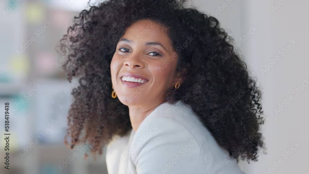 Portrait of a young beautiful lawyer looking happy and cheerful while sitting in an office at work. The face of one gorgeous black female advocate with a curly afro smiling while working alone Portrait of a young beautiful lawyer looking happy and cheerful while sitting in an office at work. The face of one gorgeous black female advocate with a curly afro smiling while working alone