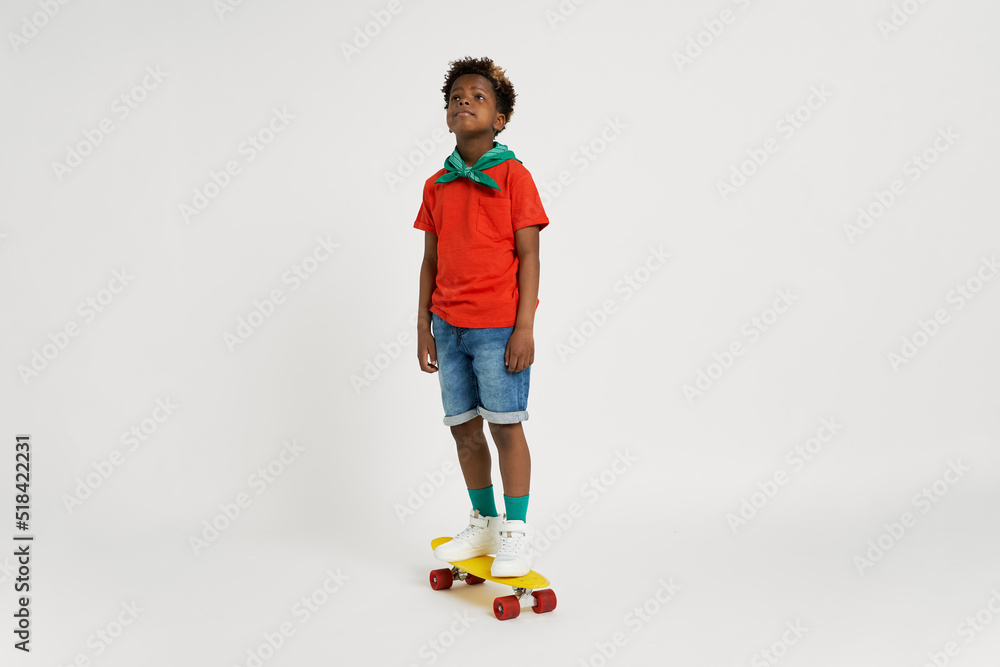 Little boy riding skateboard Little boy riding skateboard