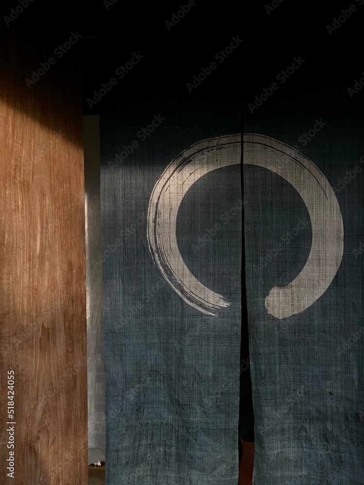 © Alexander Grabchilev/Stocksy - Zen Buddhism Symbol © Alexander Grabchilev/Stocksy - Zen Buddhism Symbol