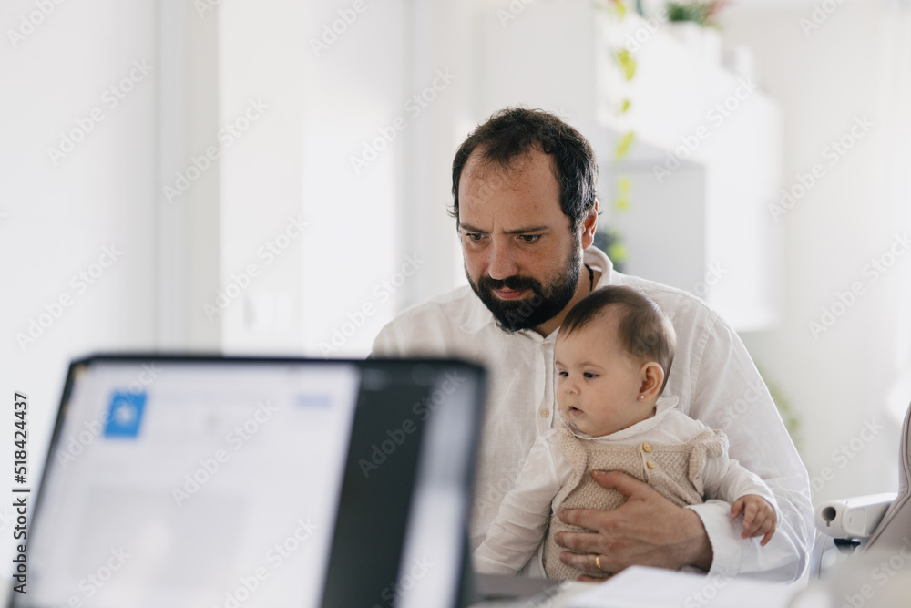 Man With Baby Working From Home Man With Baby Working From Home