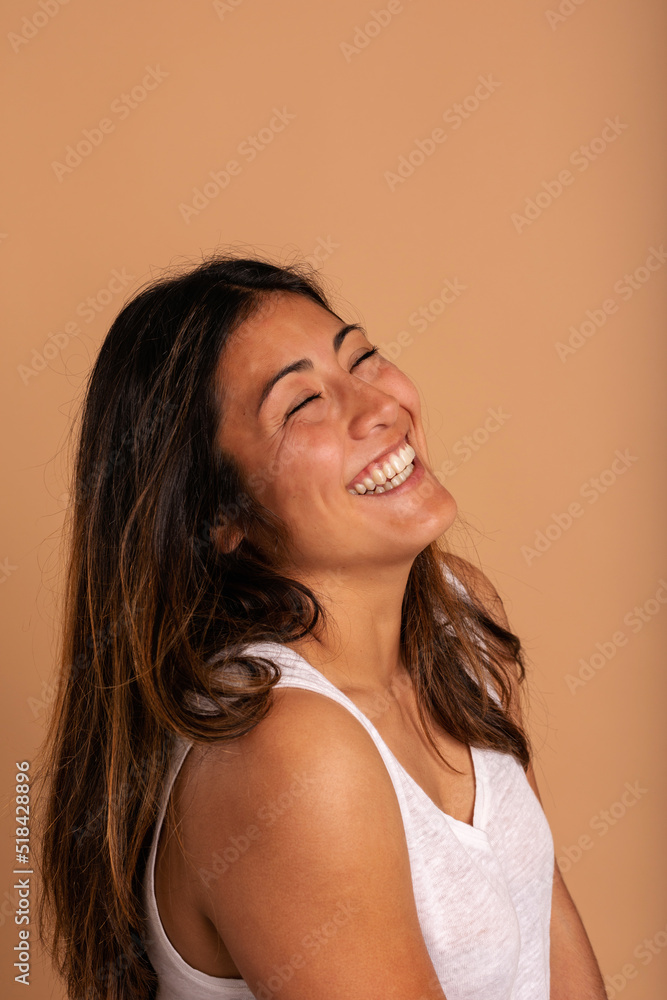 Excited multiracial woman studio portrait Excited multiracial woman studio portrait