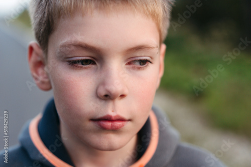 Close-up sad young boy.
