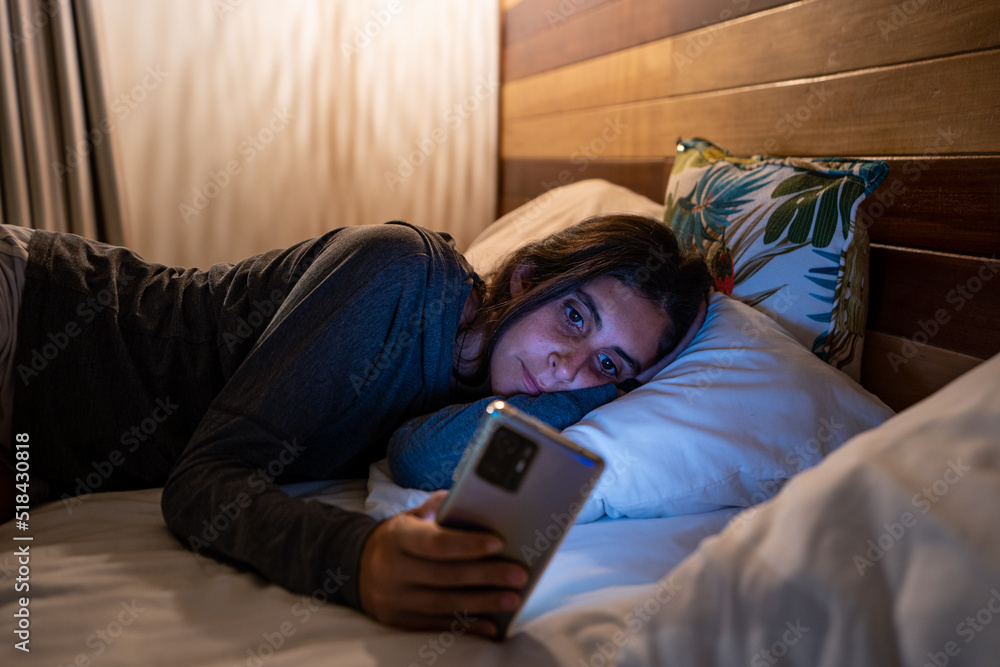  woman holding her phone