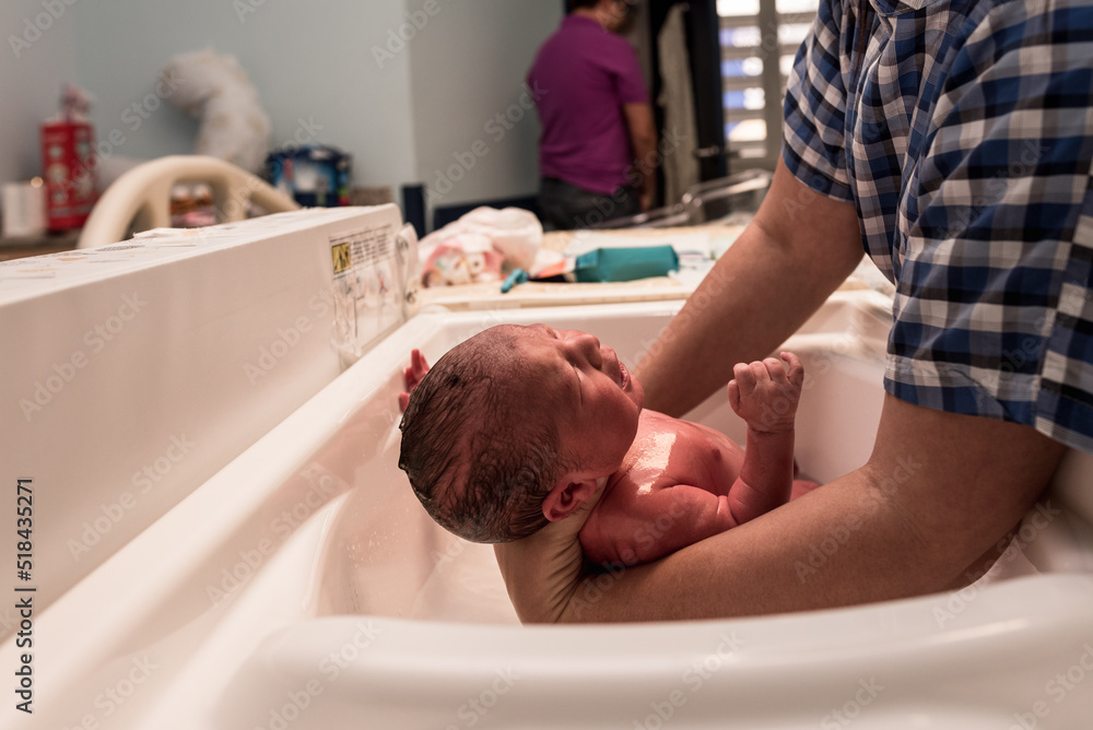Newborn in the bathtub Newborn in the bathtub