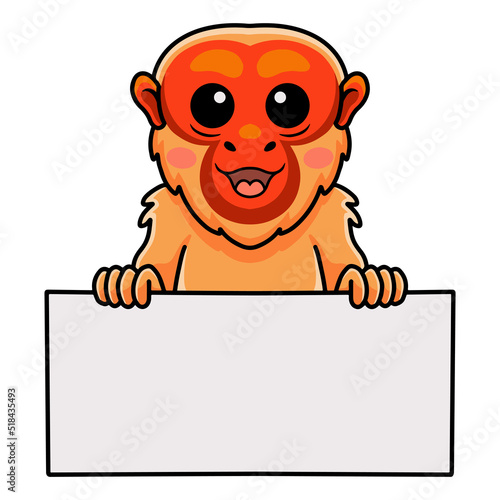 Cute bald uakari monkey cartoon holding blank sign