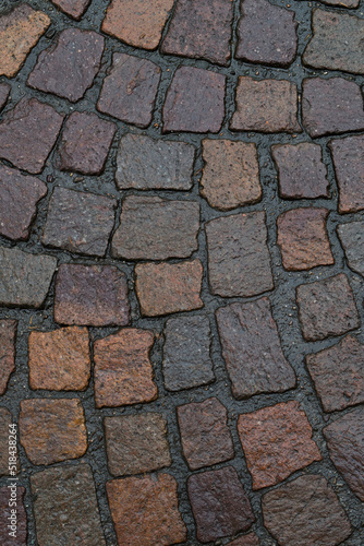 black and brown cobblestone ground pavement photo
