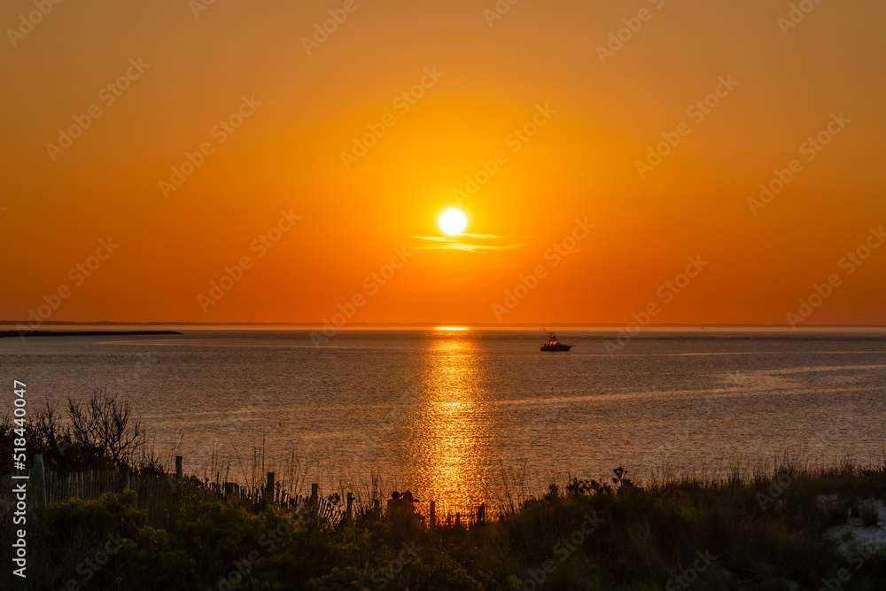 Naklejka premium Rehoboth Beach Sunset at Cape Henlopen