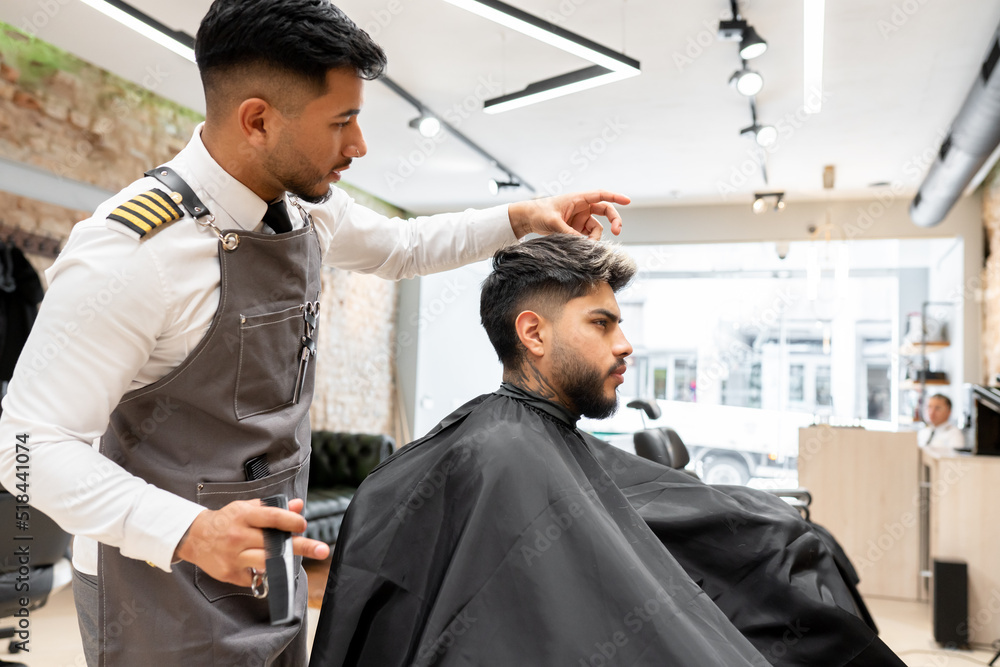 Hairdresser Cutting Hair Of Client Hairdresser Cutting Hair Of Client